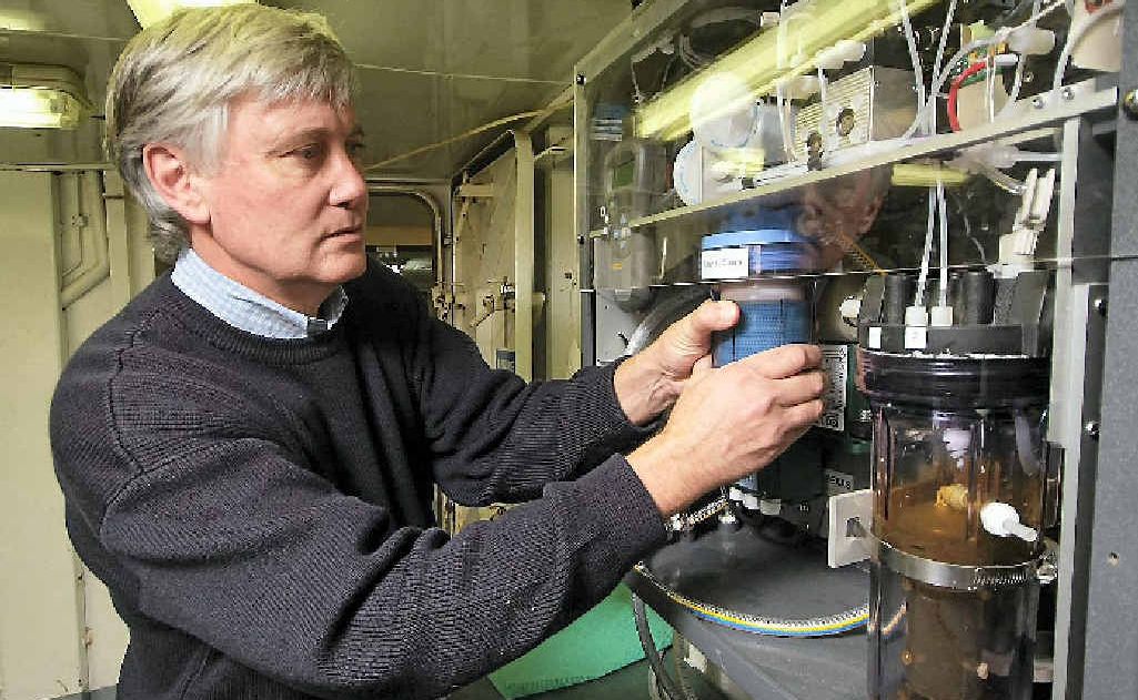 Dr Bronte Tilbrook checks shipboard equipment that samples the ocean surface. Dr Bronte Tilbrook checks shipboard equipment that samples the ocean surface.